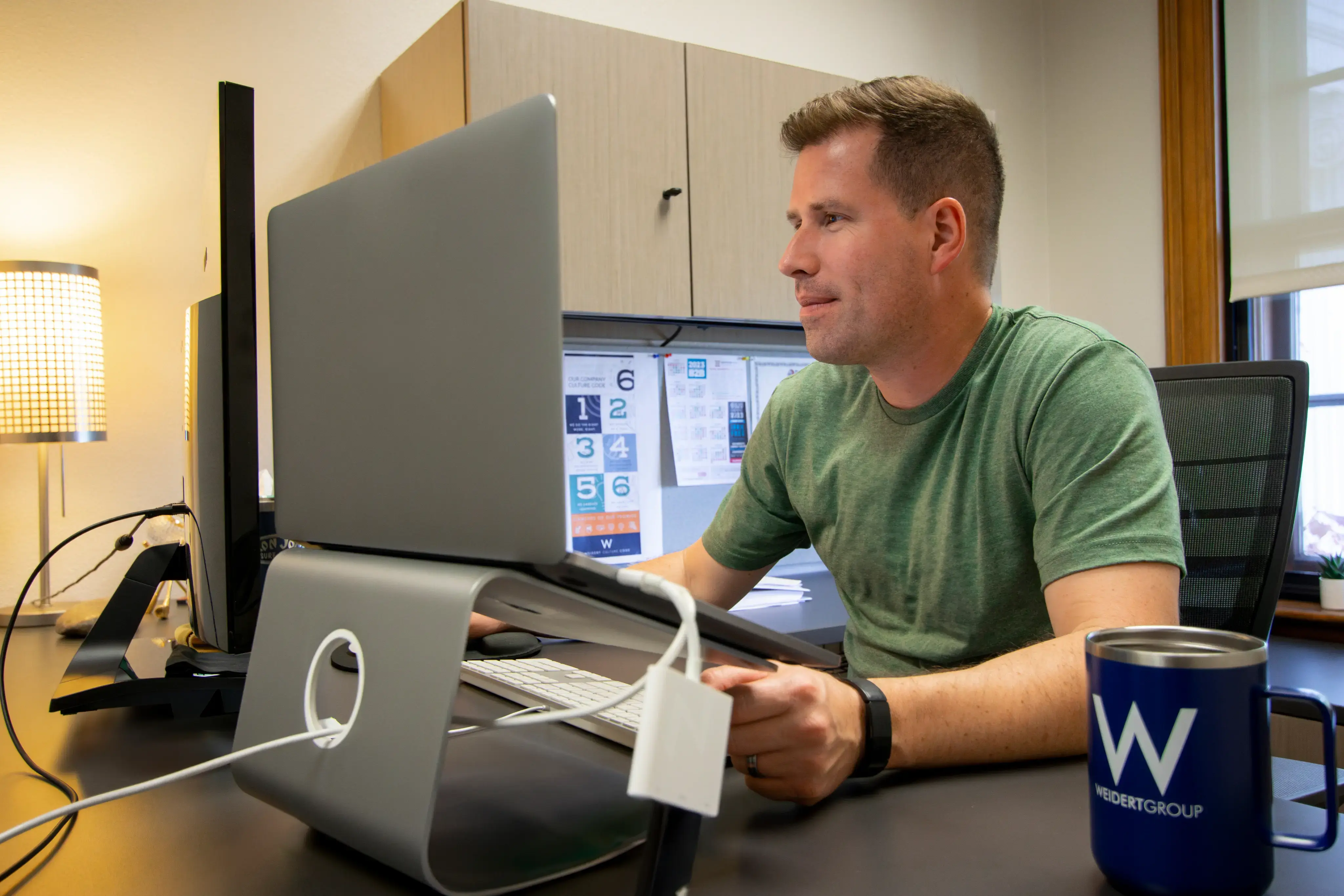 Frank working at his desk